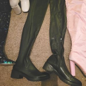 Black spandex over knee boots